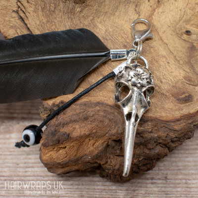 Crow Skull and Evil Eye Dangle Feather Charm.