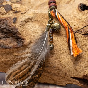 Bell and Amber Bead Feather Dangle Charm.