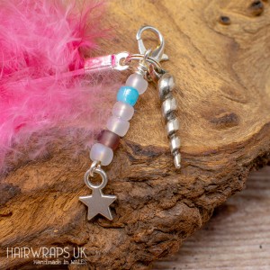 Unicorn Horn and Dangle Feather Charm.